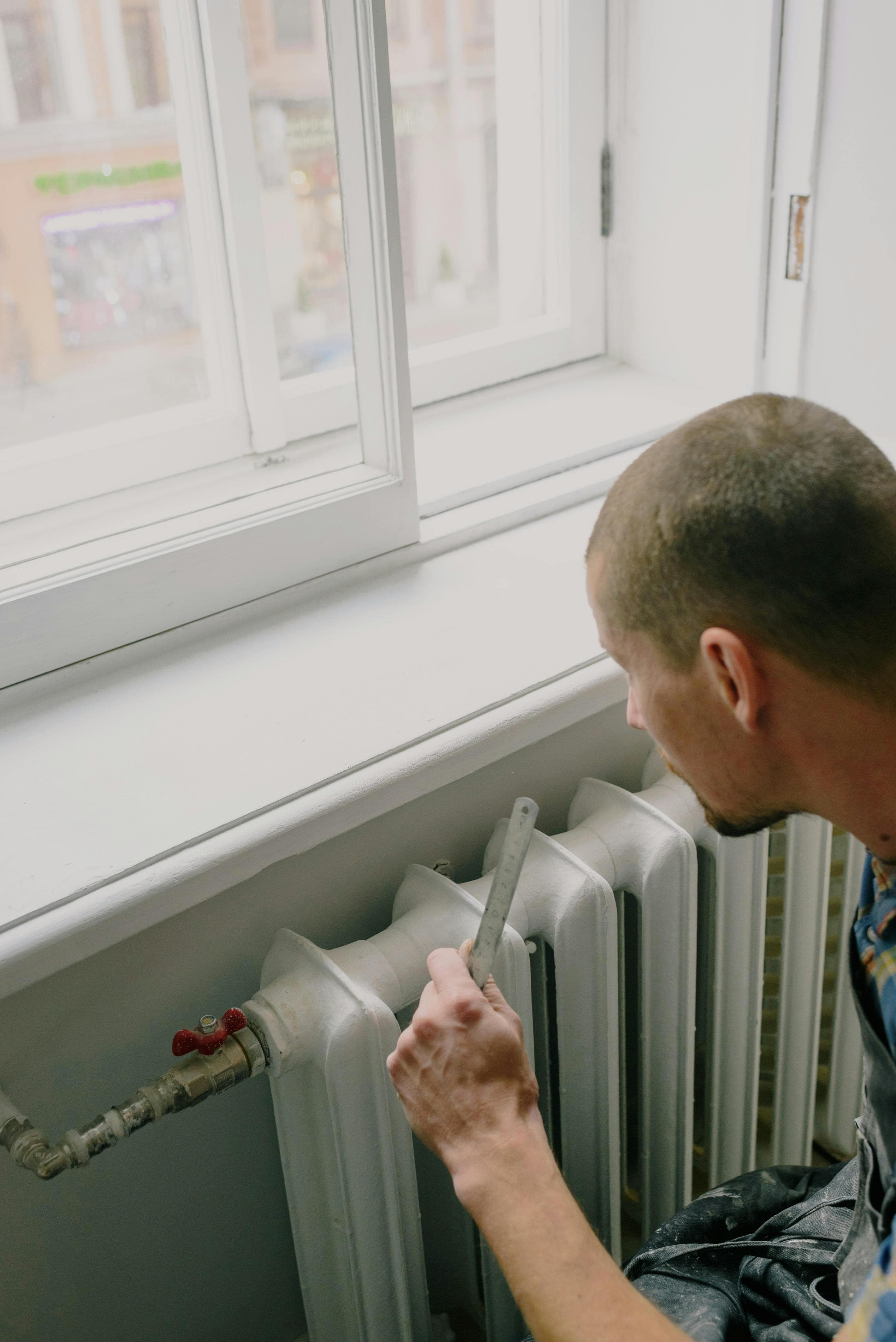 Trade professional reviewing work on site
